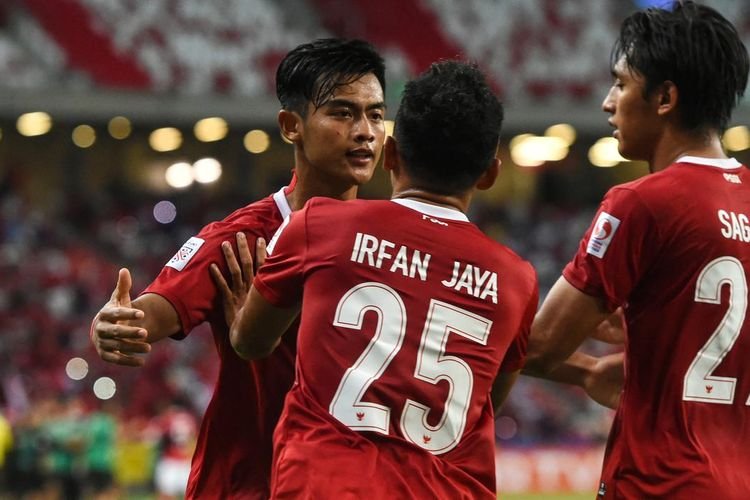 Melalui pertandingan yang sarat drama, Indonesia memastikan diri ke final Piala AFF 2020. (Foto : AFP/Roslan Rahman)