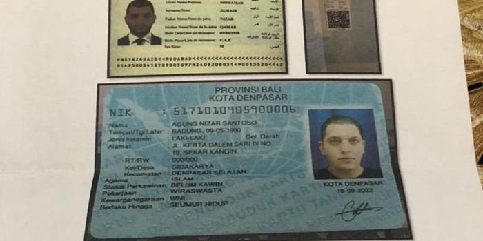 Paspor dan KTP warga negara Suriah