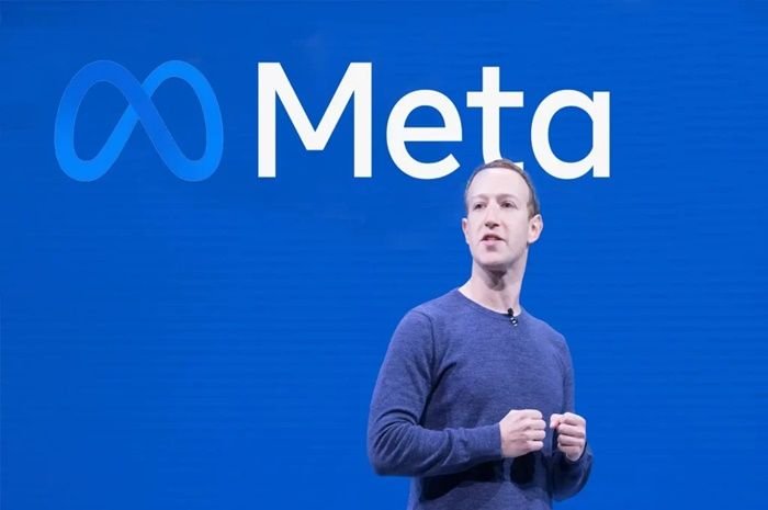 Mark Zukerberg dan logo Meta